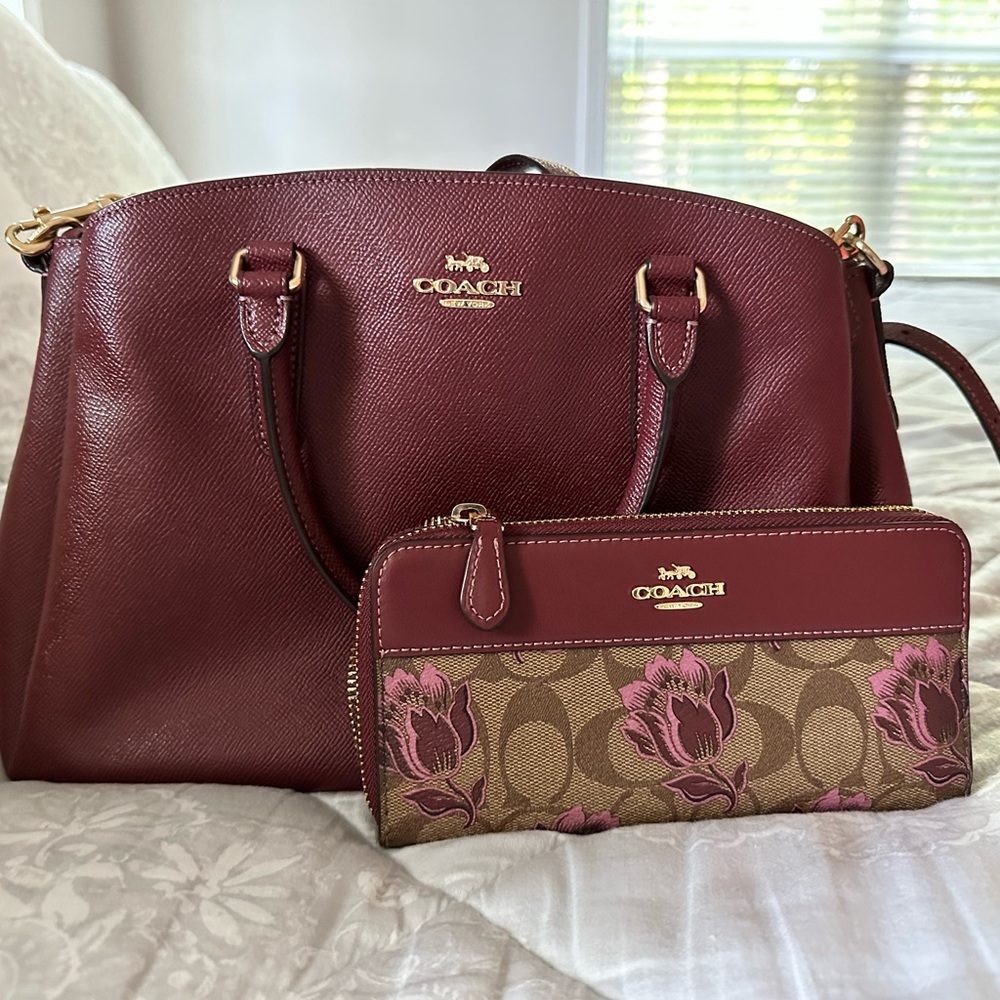 Coach wine colored tote with matching large zip around wallet